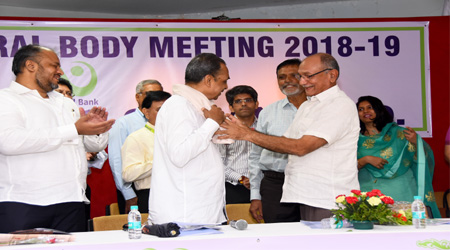  Hon’ble Director Dr. A. B. Patil felicitating the Bank’s Chairman Shri S. T. Kharmate